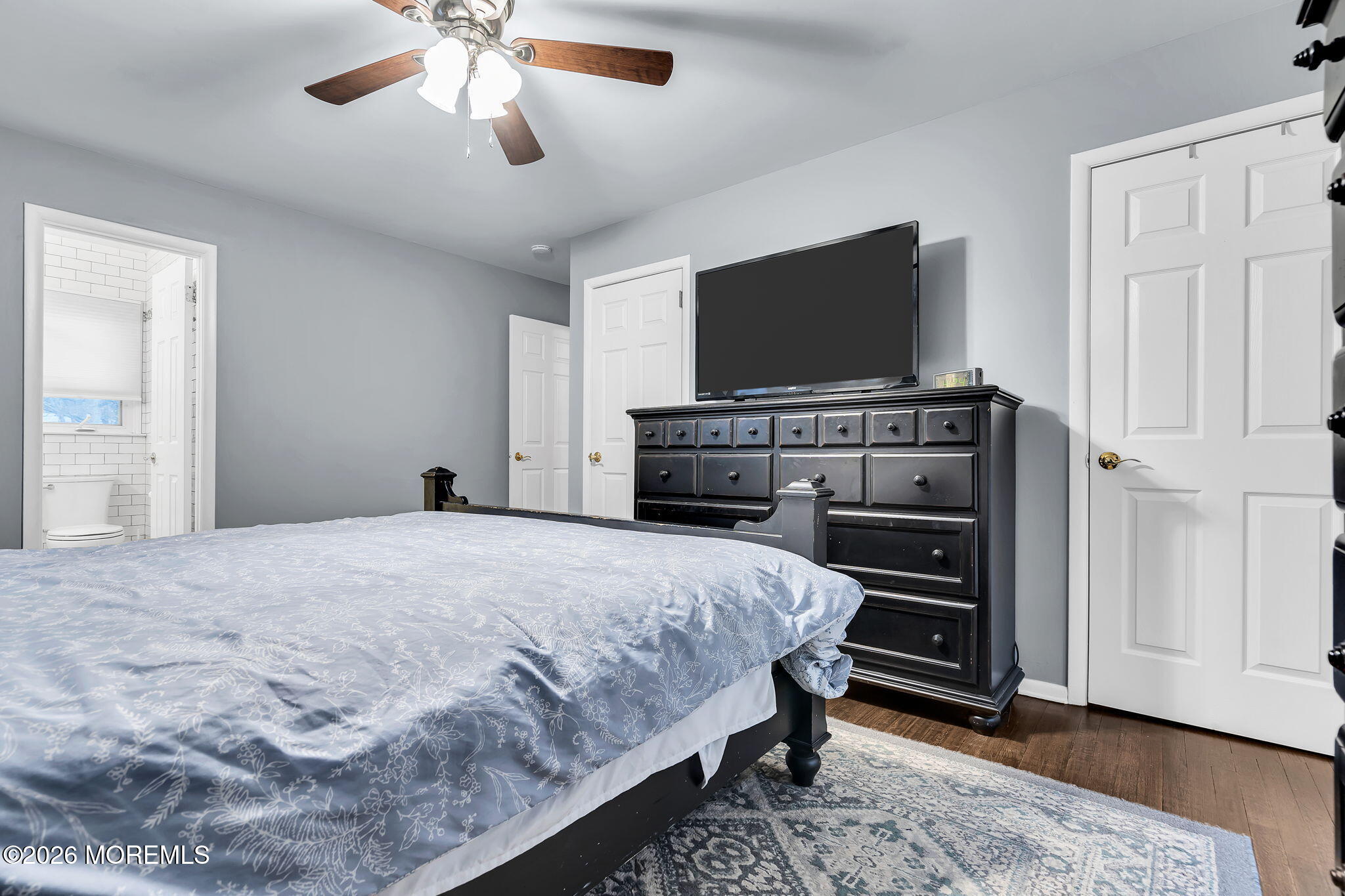 26 North Westfield Road Howell, NJ 07731 - Photo 31 of 59 a bedroom with a bed and a flat screen tv