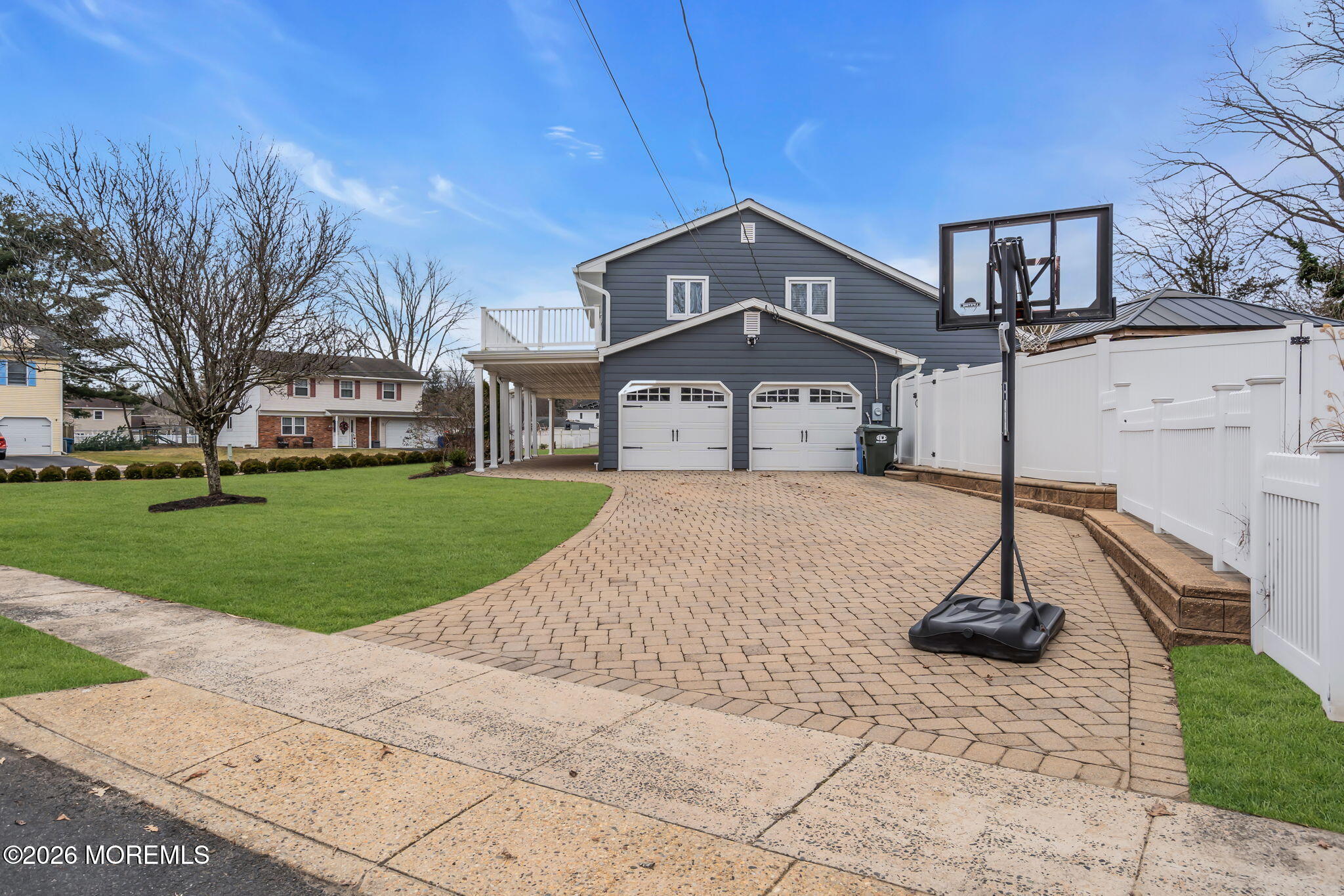 26 North Westfield Road Howell, NJ 07731 - Photo 43 of 59 a front view of a house with a yard