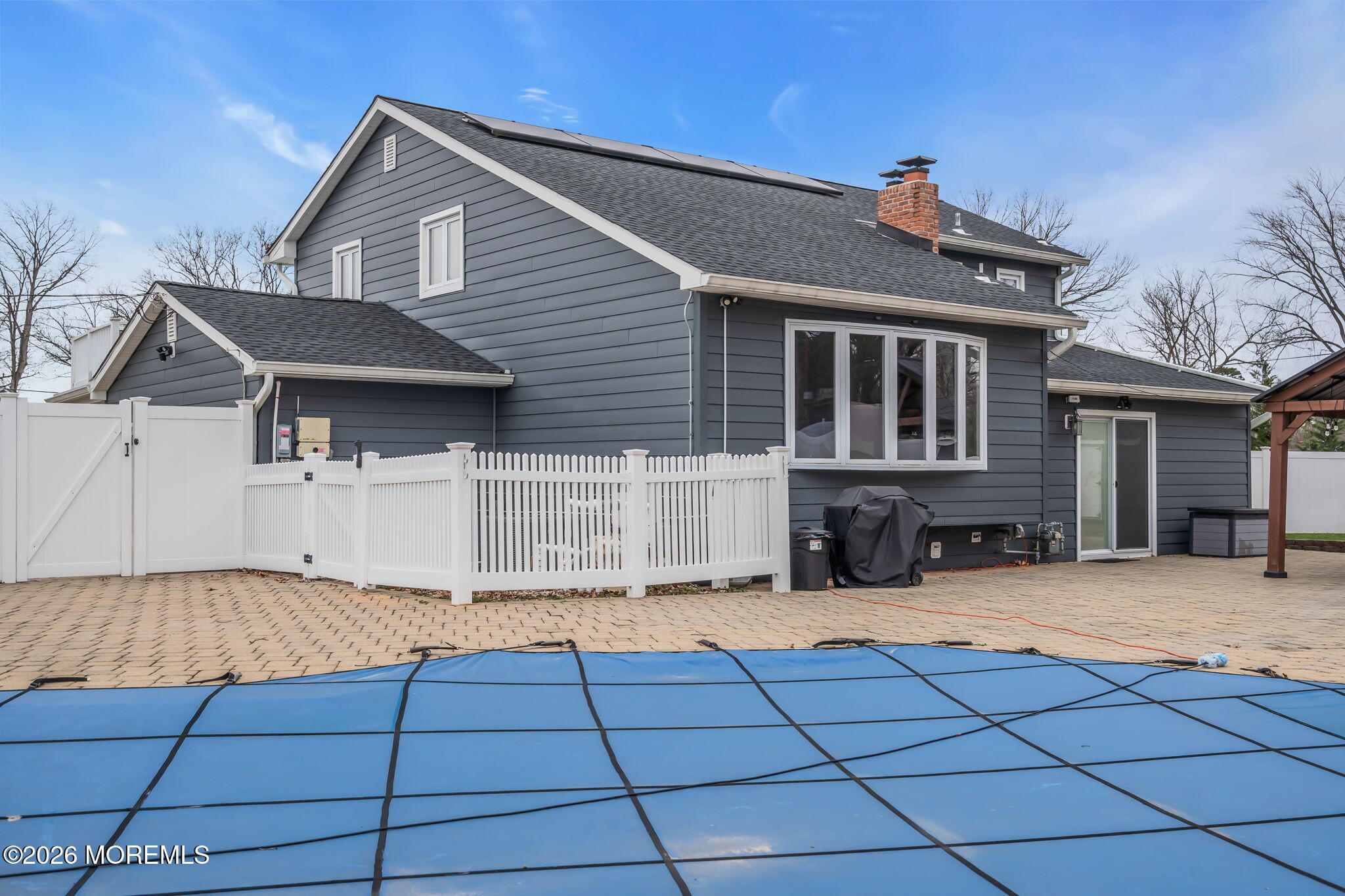 26 North Westfield Road Howell, NJ 07731 - Photo 51 of 59 a front view of house with yard and seating area