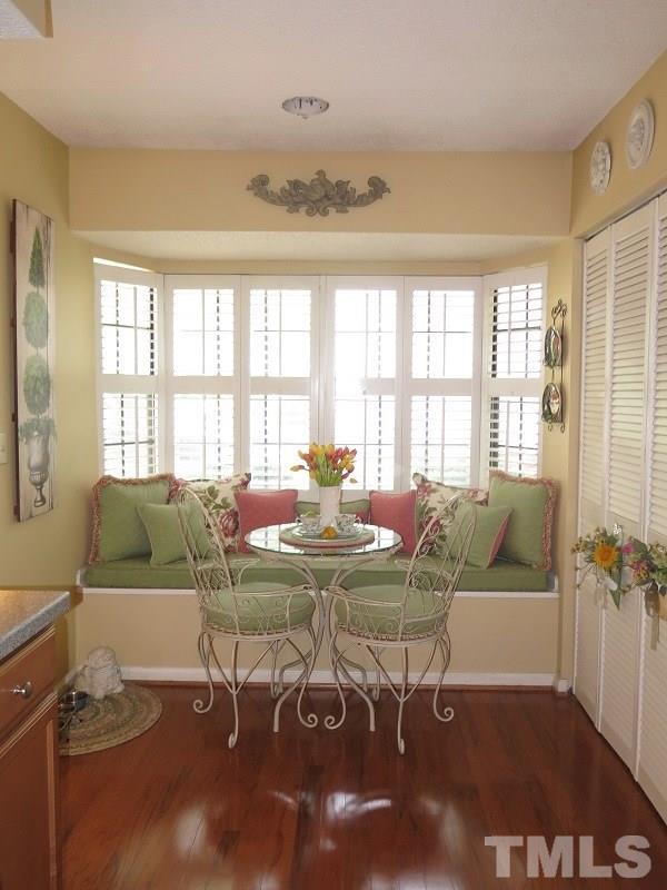 7752 Falcon Rest Circle, Unit 7752 Raleigh, NC 27615 - Photo 10 of 17 a living room with furniture and a large window