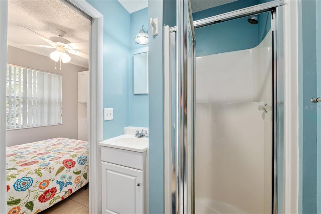 9770 Southwest 97th Place Ocala, FL 34481 - Photo 38 of 64 a bedroom with a bed and hallway