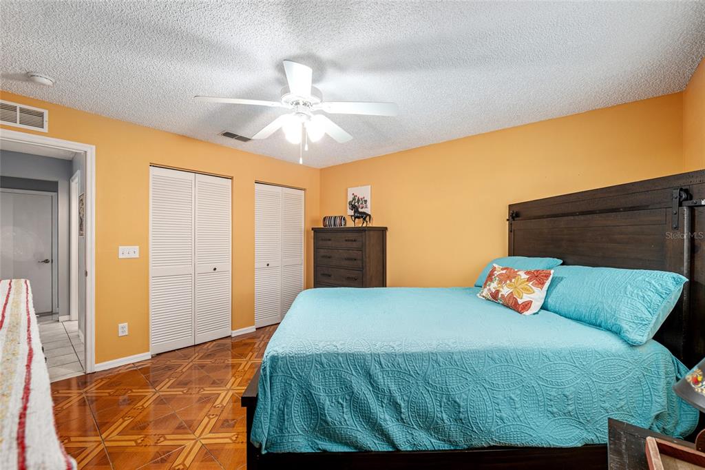 9770 Southwest 97th Place Ocala, FL 34481 - Photo 40 of 64 a bedroom with a bed and window