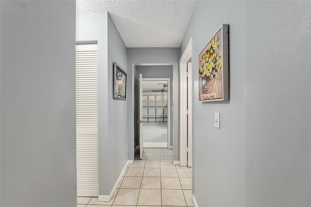 9770 Southwest 97th Place Ocala, FL 34481 - Photo 41 of 64 a view of a hallway