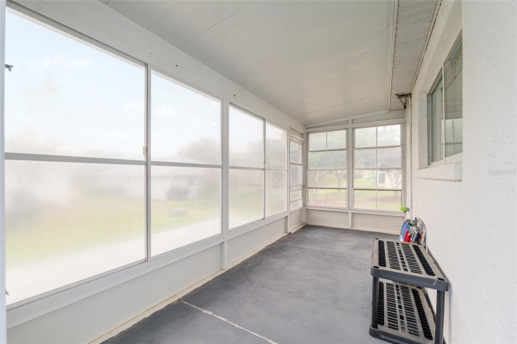 9770 Southwest 97th Place Ocala, FL 34481 - Photo 57 of 64 a view of an empty room and window