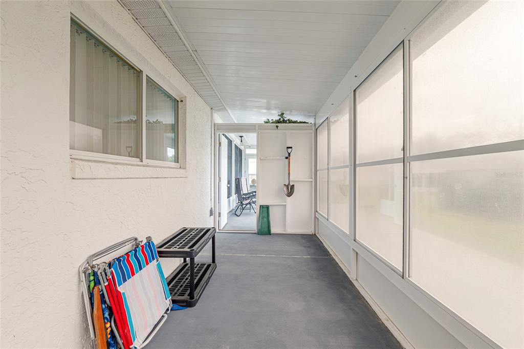 9770 Southwest 97th Place Ocala, FL 34481 - Photo 58 of 64 a view of an entryway with wooden floor