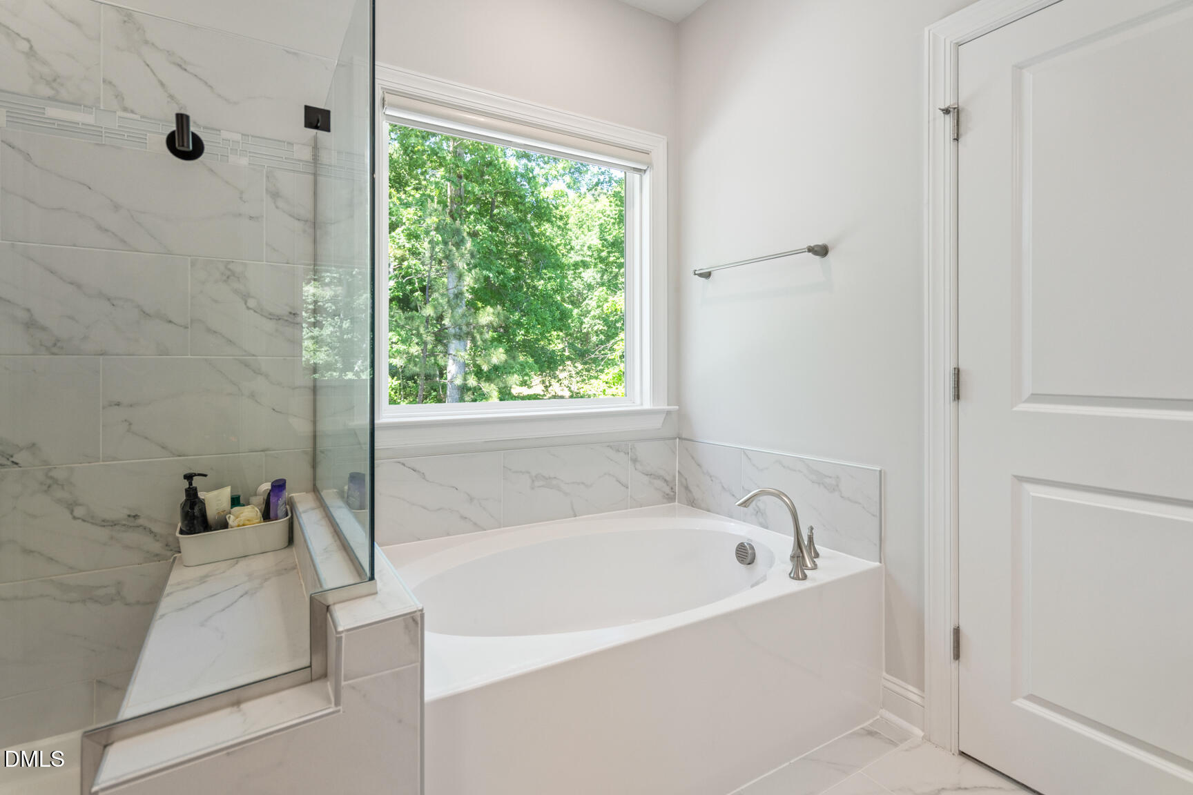 2966 Rise And Shine Road Apex, NC 27502 - Photo 34 of 61 a white bath tub sitting in a bathroom next to a window
