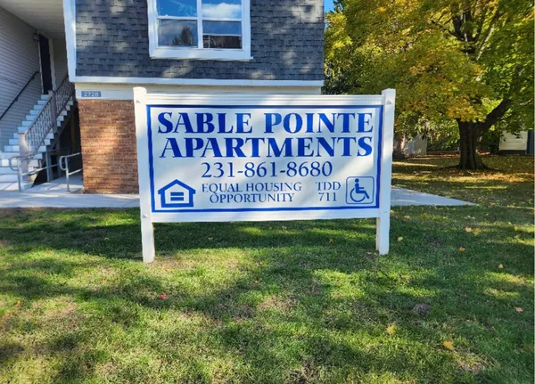 a sign on the side of a building