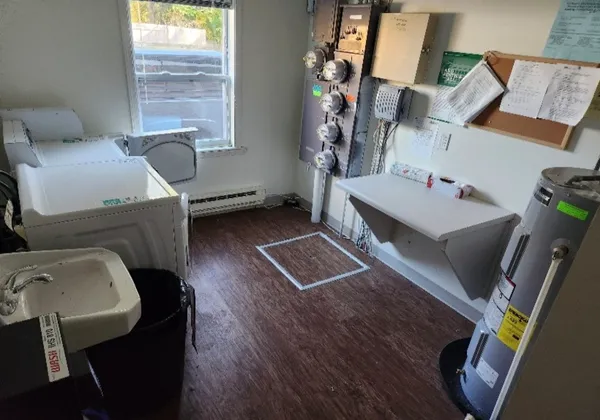 a living room with furniture and a window