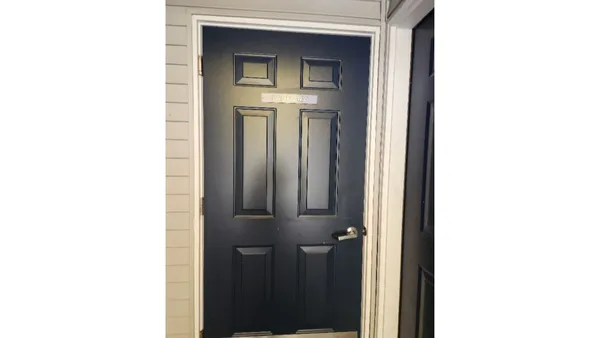 a view of a hallway with closet