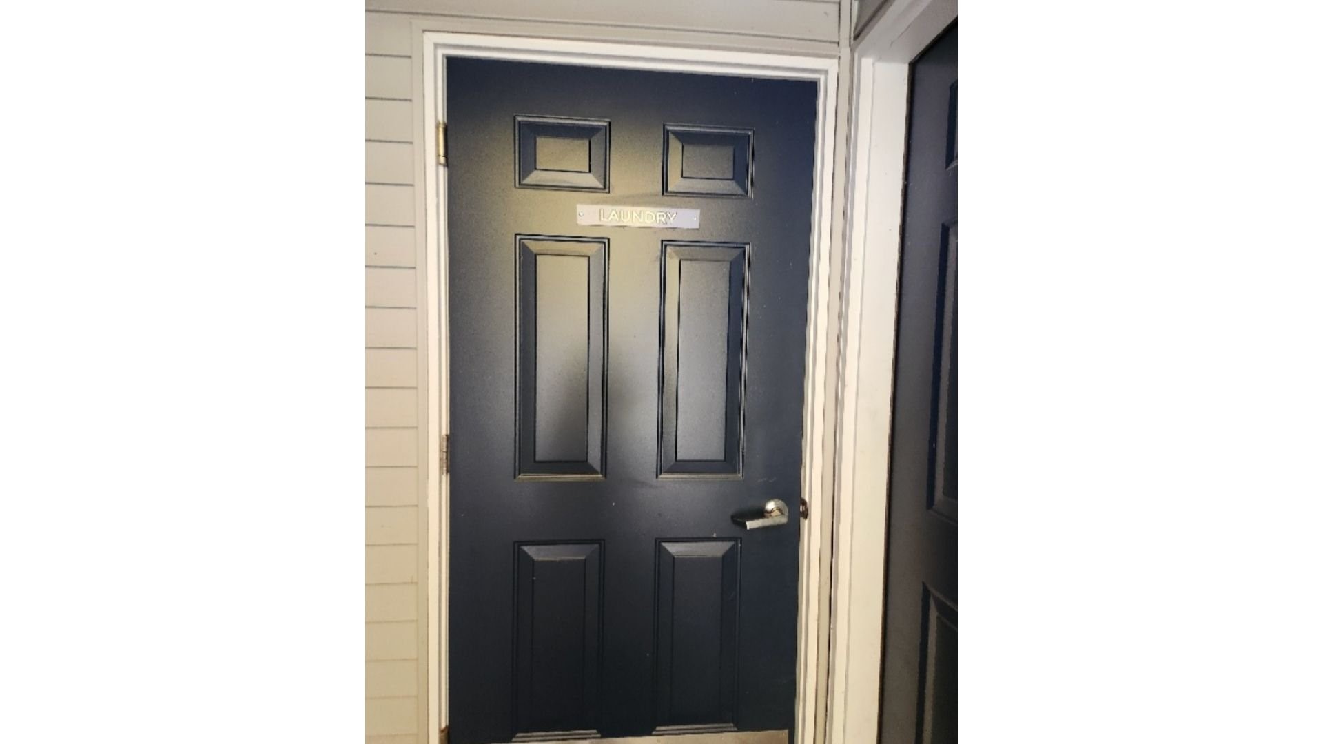 907 South State Street Hart, MI 49420 - Photo 9 of 10 a close view of a room with a door and a white wall