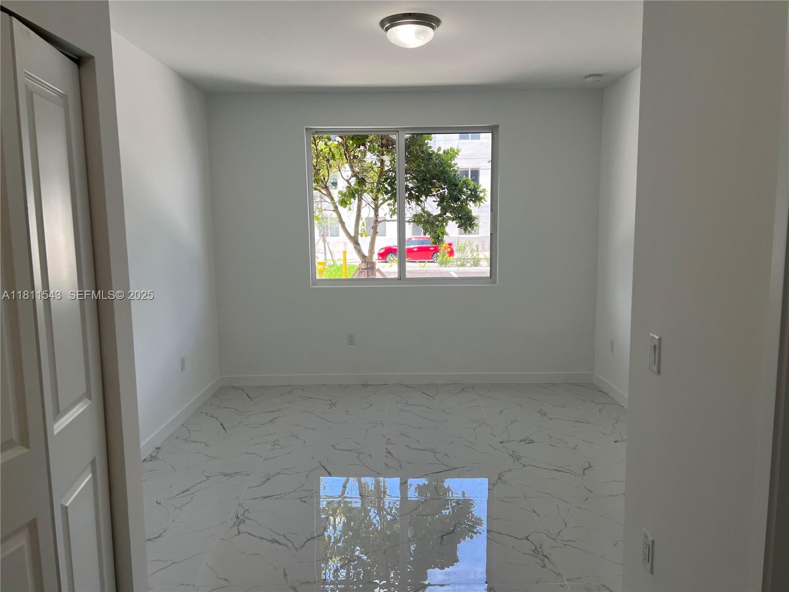 1010 Southwest 69th Avenue, Unit 104 Miami, FL 33144 - Photo 11 of 16 a view of entryway