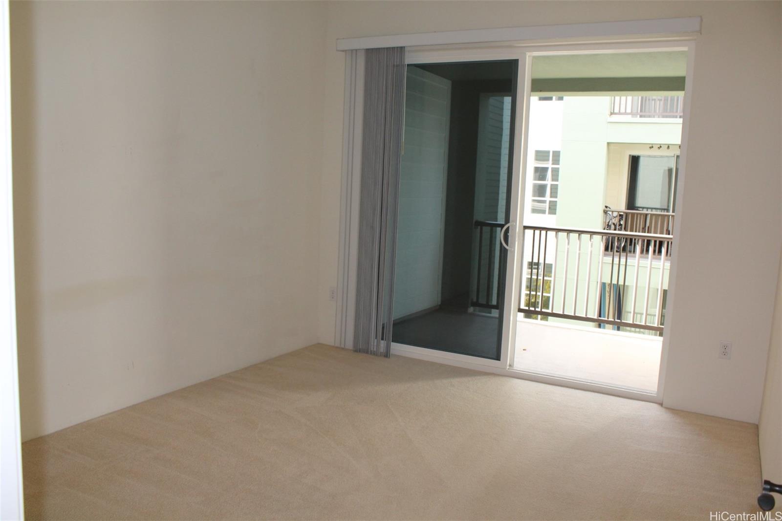 520 Lunalilo Home Road, Unit 7328 Honolulu, HI 96825 - Photo 11 of 22 a view of empty room with floor to ceiling window