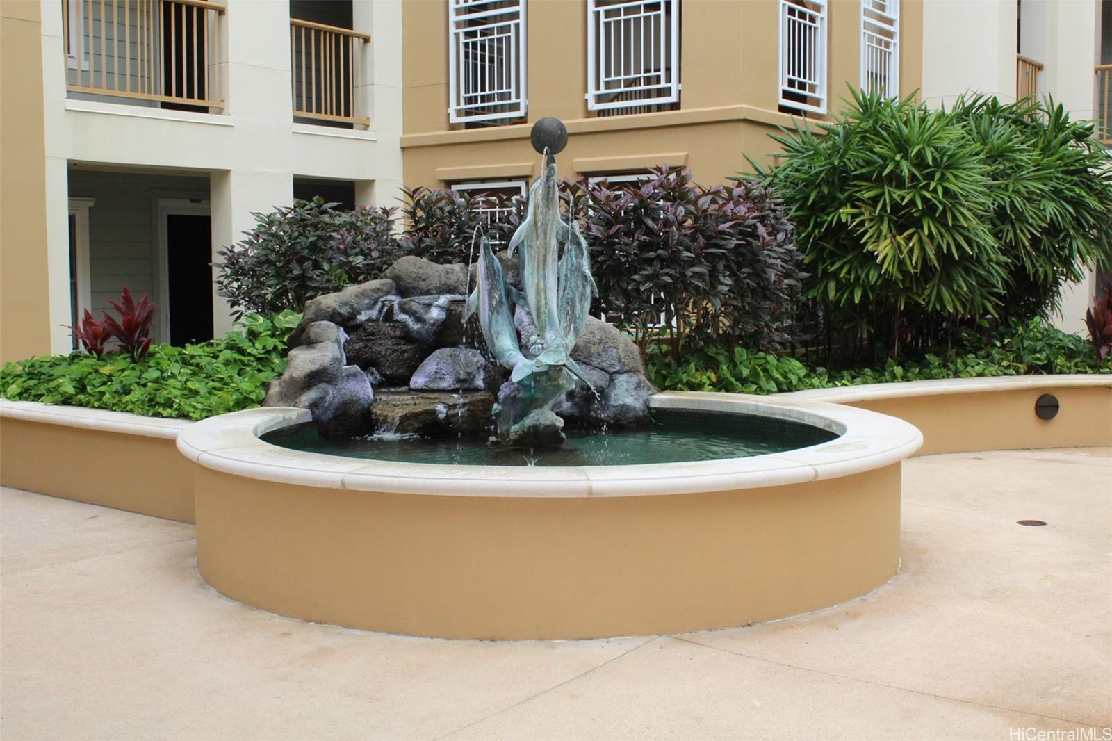520 Lunalilo Home Road, Unit 7328 Honolulu, HI 96825 - Photo 16 of 22 a view of a white house with a potted plant and a sink