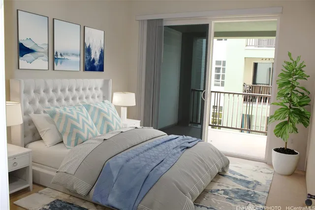 a bedroom with a large bed and a potted plant