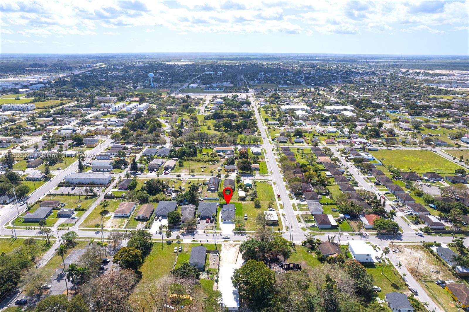 673 Northwest 14th Street, Unit 1 Florida City, FL 33034 - Photo 2 of 20 an aerial view of residential building with green space