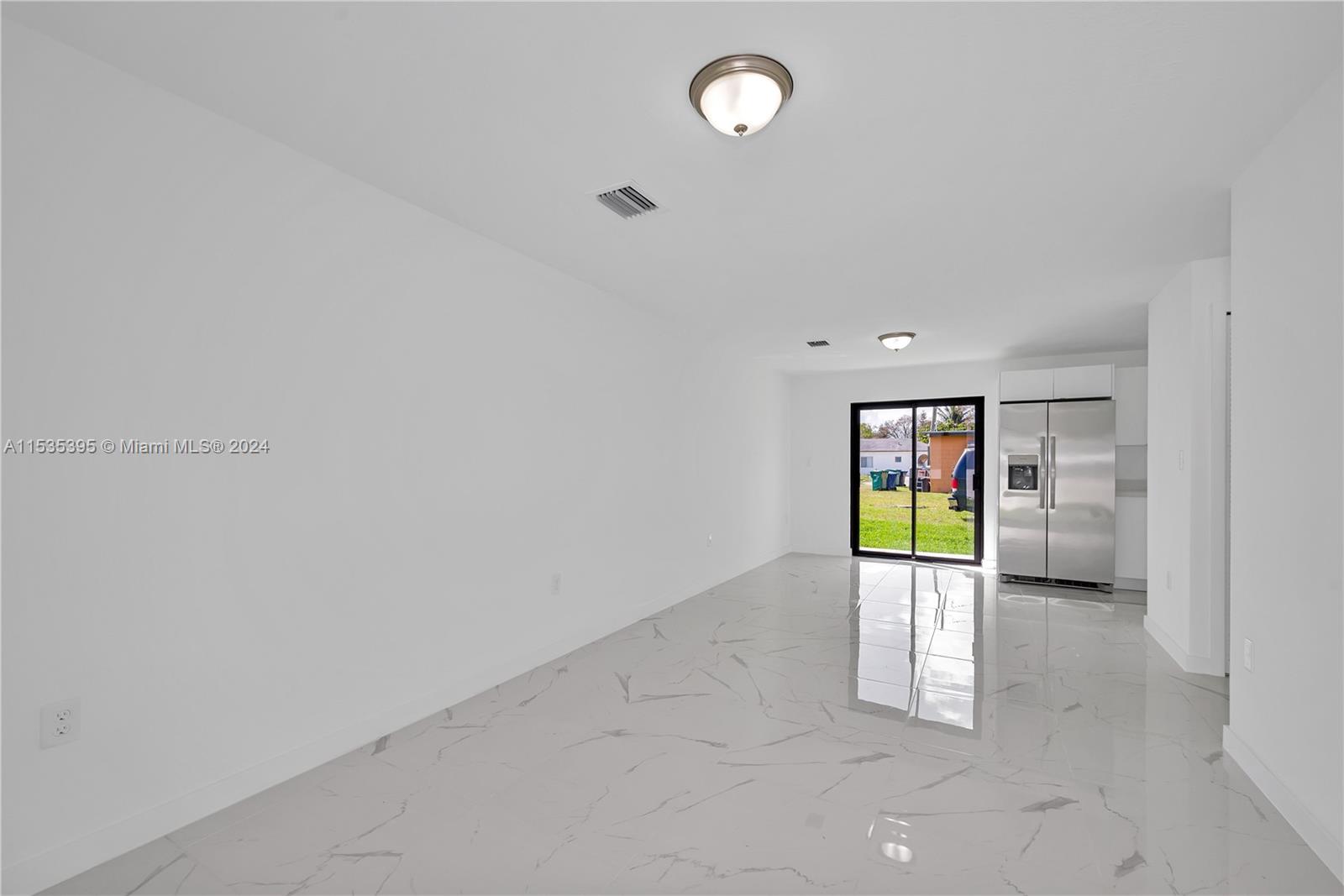 673 Northwest 14th Street, Unit 1 Florida City, FL 33034 - Photo 6 of 20 a view of an empty room