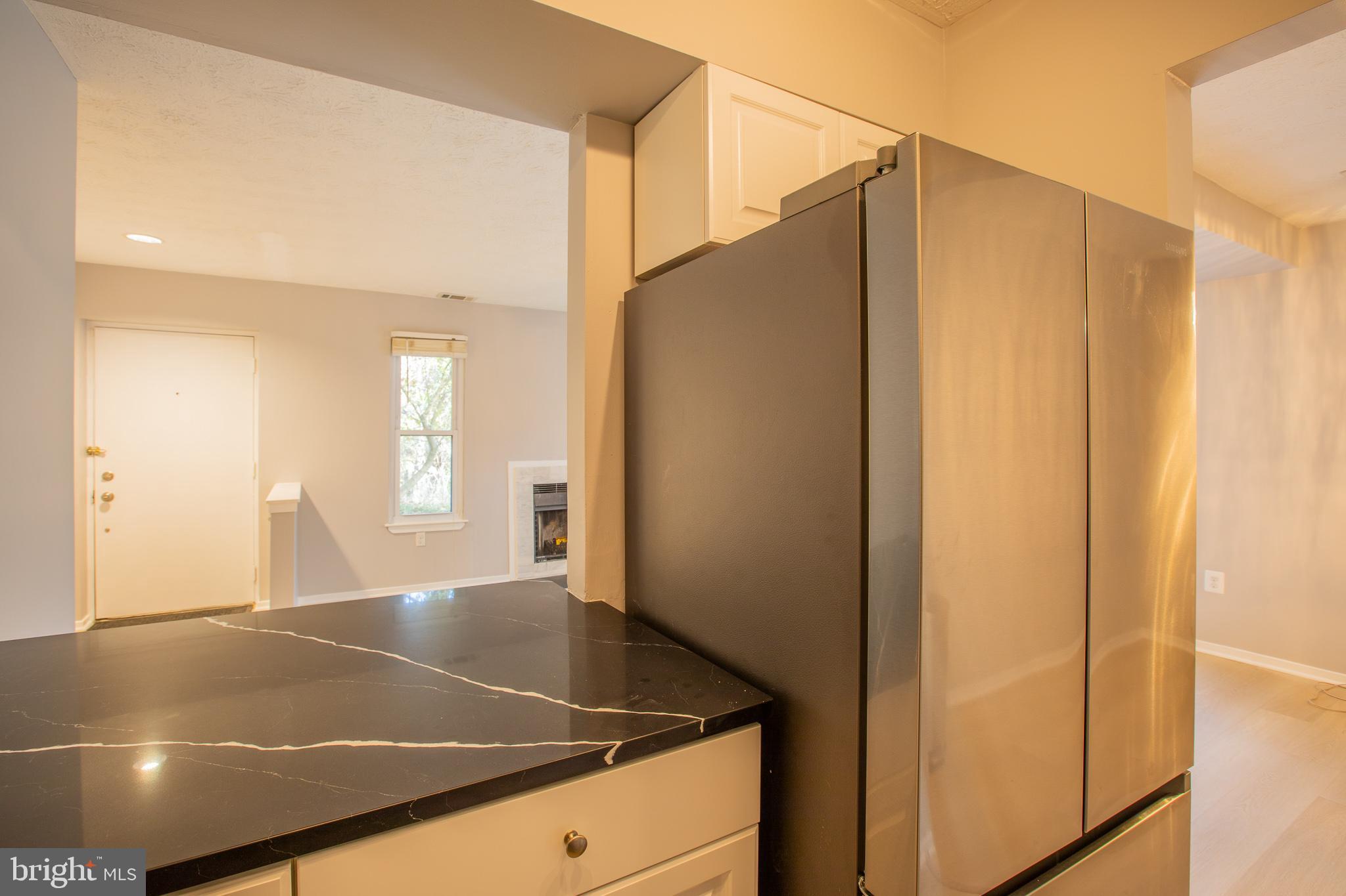 7537 Weather Worn Way, Unit A Columbia, MD 21046 - Photo 13 of 23 a view of an empty room
