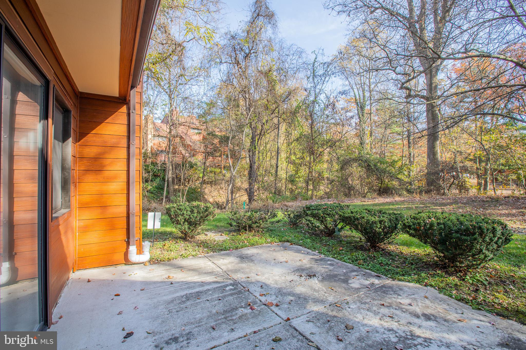 7537 Weather Worn Way, Unit A Columbia, MD 21046 - Photo 23 of 23 a view of a backyard of the house