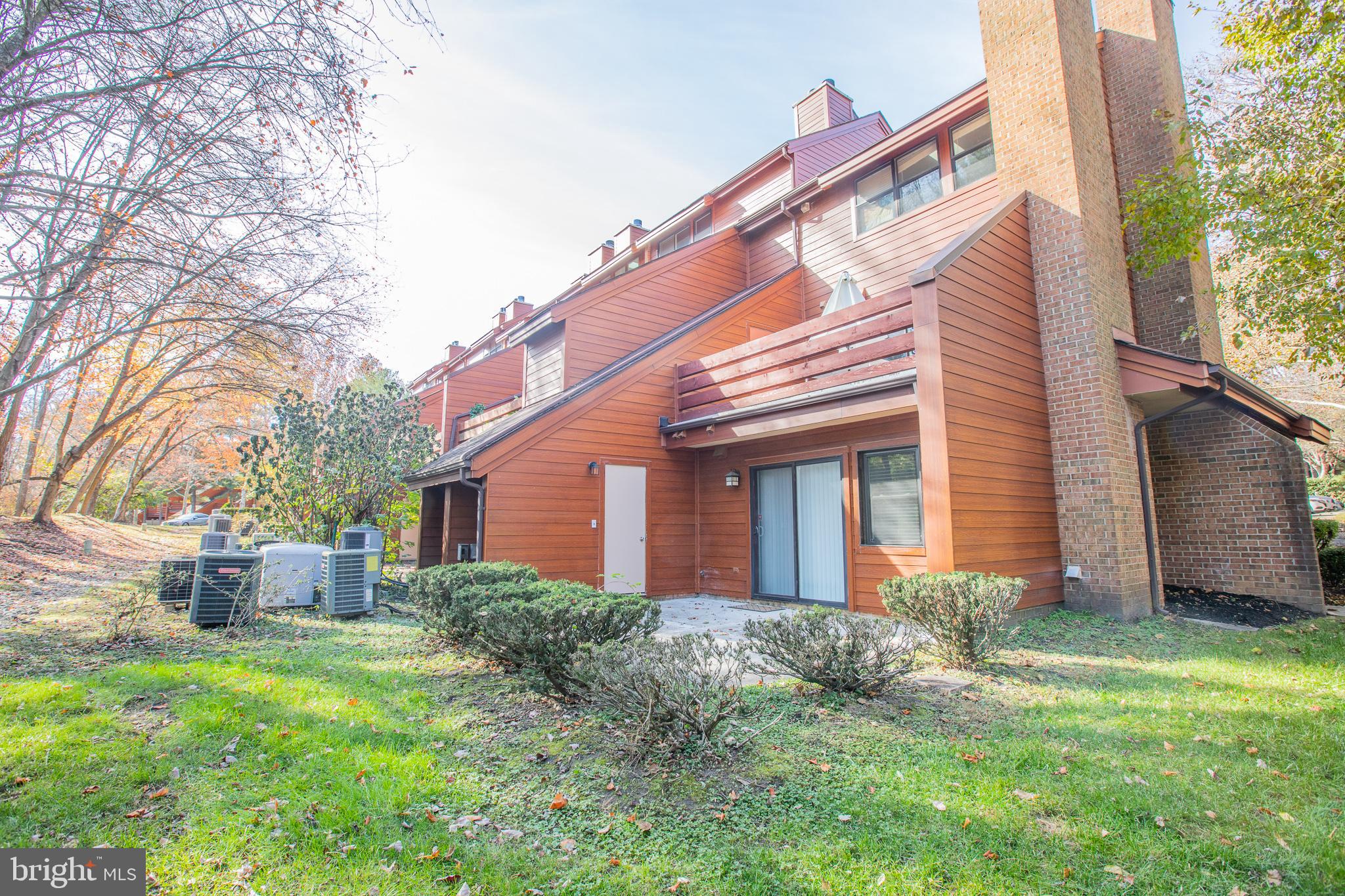 7537 Weather Worn Way, Unit A Columbia, MD 21046 - Photo 3 of 23 a view of a house with backyard and garden