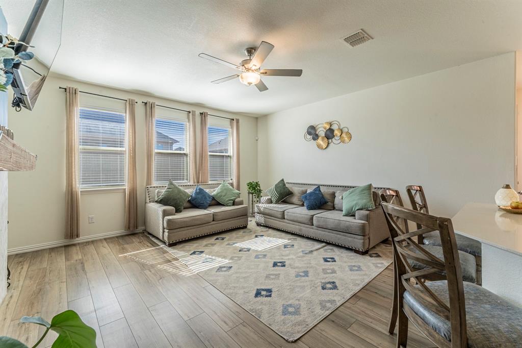 1240 Almond Road Azle, TX 76020 - Photo 3 of 26 Living room featuring large windows