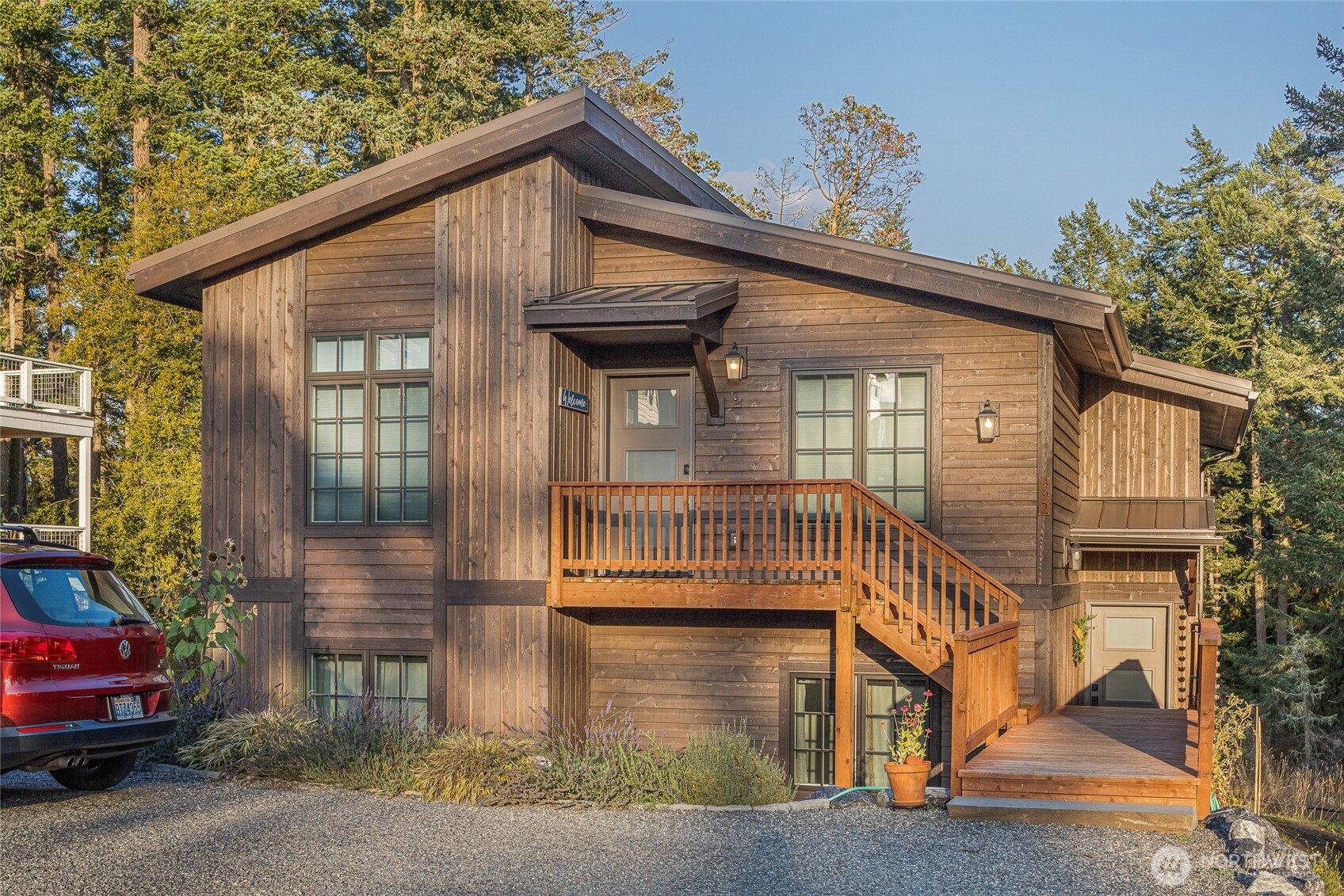 492 Finnegan Ridge, Unit 2 Friday Harbor, WA 98250 - Photo 1 of 29 a front view of a house with a yard