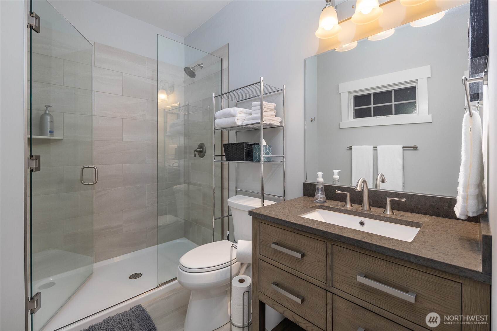 492 Finnegan Ridge, Unit 2 Friday Harbor, WA 98250 - Photo 17 of 29 a bathroom with a sink a toilet and shower
