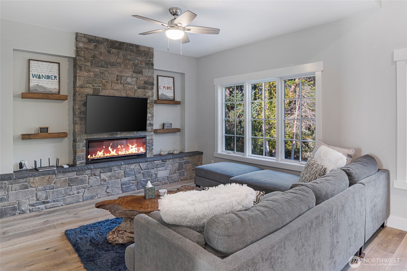 492 Finnegan Ridge, Unit 2 Friday Harbor, WA 98250 - Photo 5 of 29 a living room with furniture and a flat screen tv