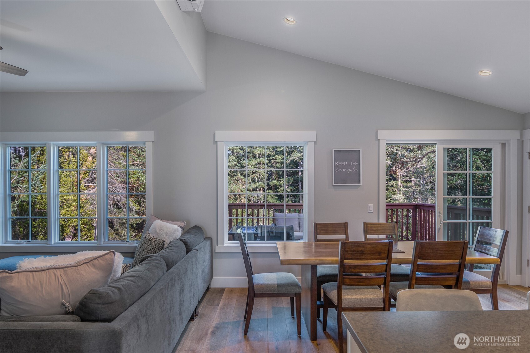 492 Finnegan Ridge, Unit 2 Friday Harbor, WA 98250 - Photo 6 of 29 a living room with furniture and a large window