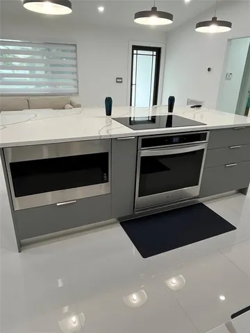 a utility room with cabinets