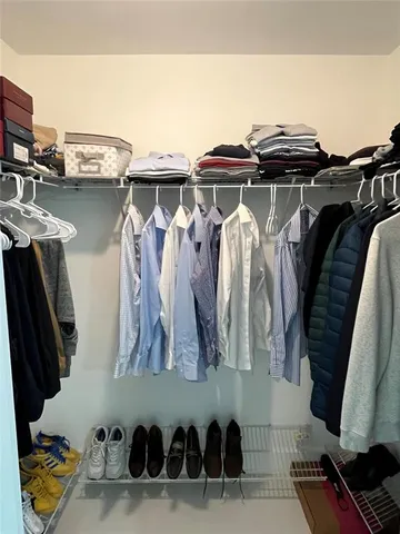 a bathroom with a sink toilet and mirror