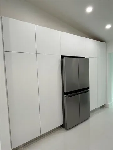 a kitchen with a stove and a sink