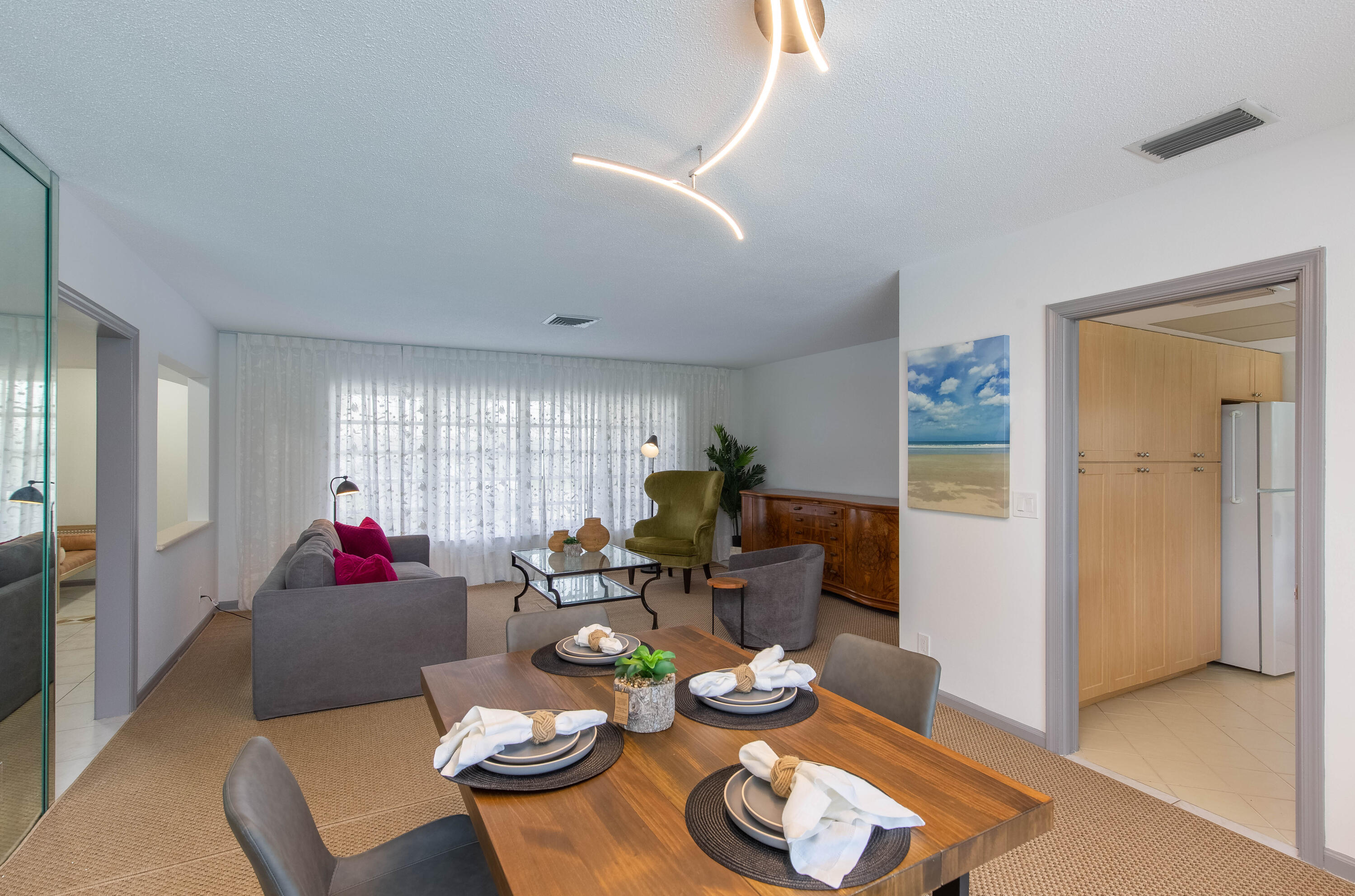 1323 Sugar Plum Drive Boca Raton, FL 33486 - Photo 4 of 28 a living room with furniture and a window