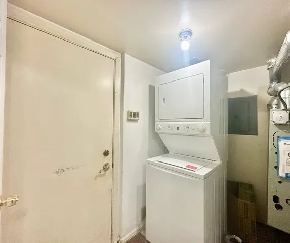a view of a room with rack and wooden floor