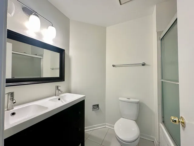 an empty room with a empty space and windows