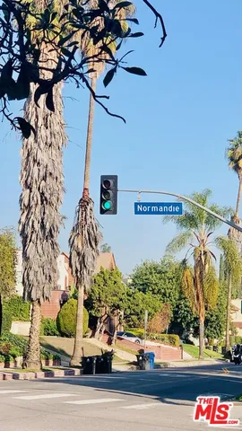 a view of street along with trees