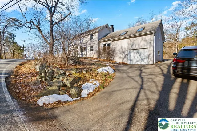 a view of a house with a snow on the wall