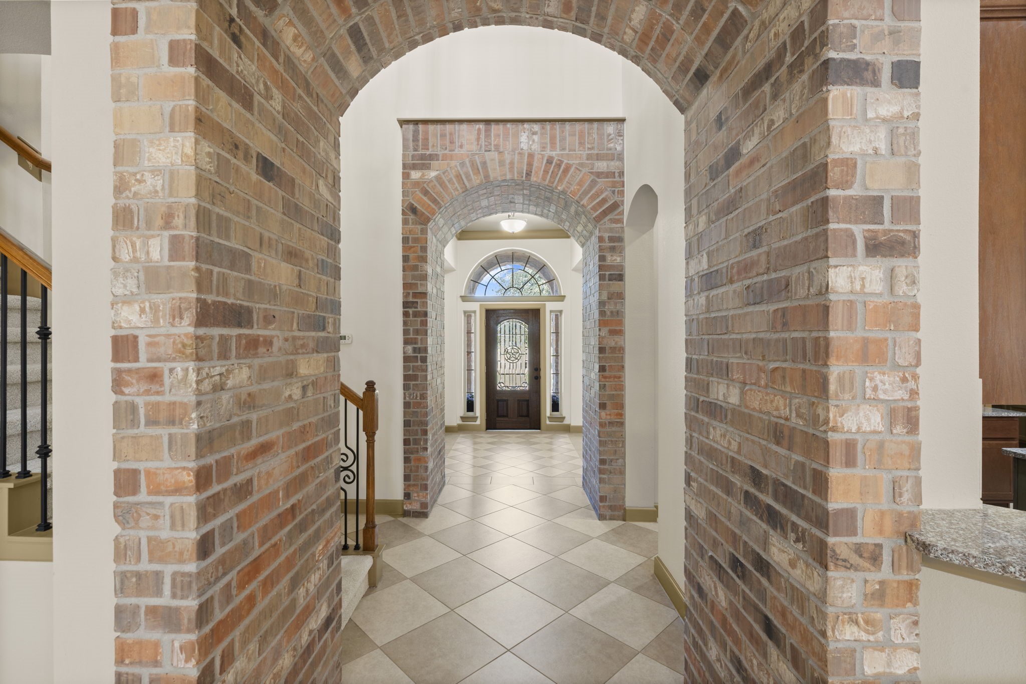 1534 Virgie Community Road Magnolia, TX 77354 - Photo 15 of 50 The brick and Austin limestone accents along with the fantastic architectural design make this home extremely special and unique. These accents are even more beautiful in person.