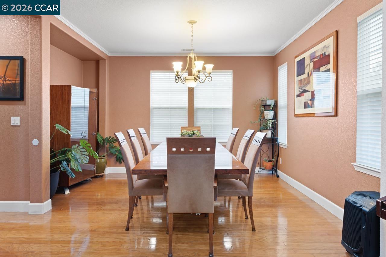 995 Rosehedge Court Concord, CA 94521 - Photo 16 of 70 a view of a dining room with furniture window and wooden floor