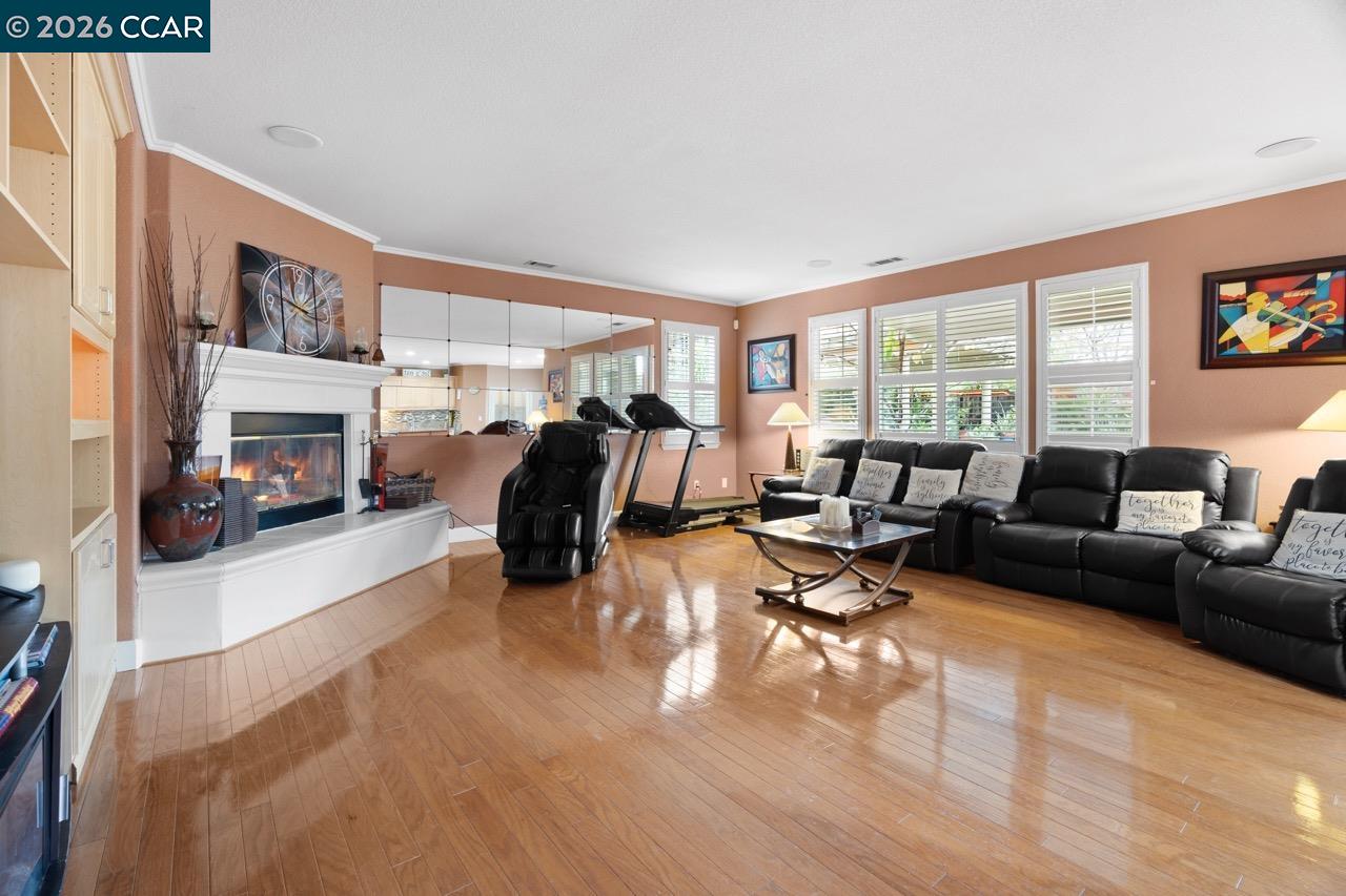 995 Rosehedge Court Concord, CA 94521 - Photo 26 of 70 a living room with furniture and a floor to ceiling window