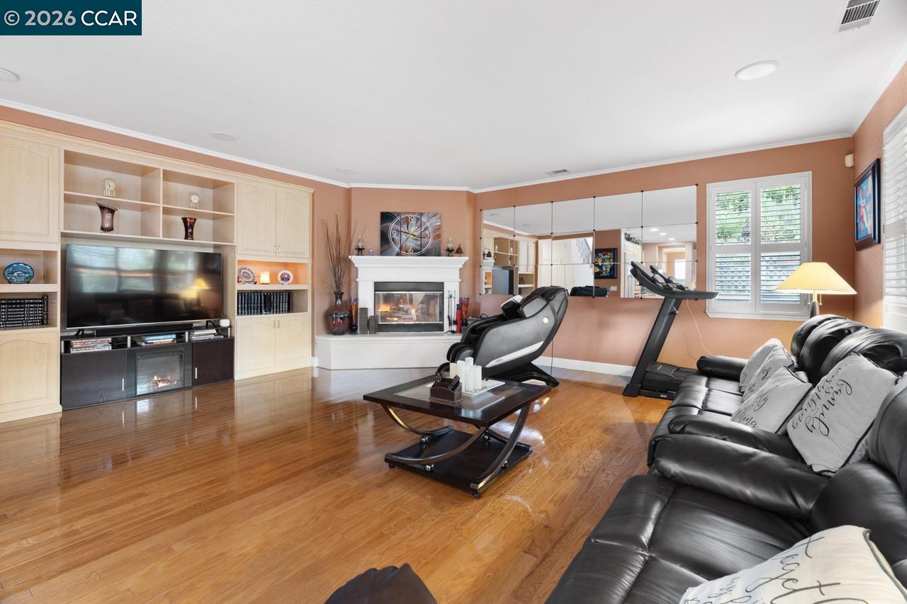 995 Rosehedge Court Concord, CA 94521 - Photo 28 of 70 a living room with furniture and a flat screen tv