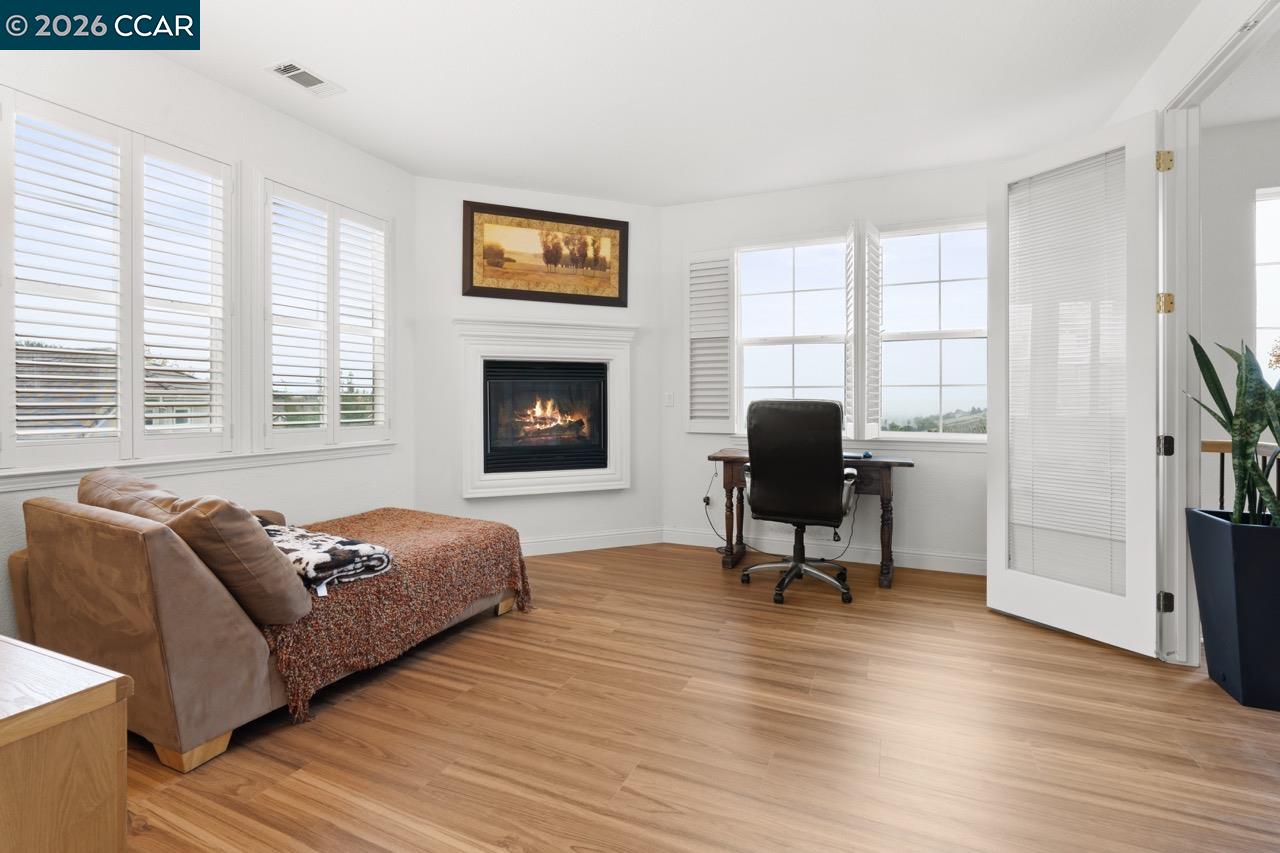 995 Rosehedge Court Concord, CA 94521 - Photo 36 of 70 a living room with furniture and a fireplace