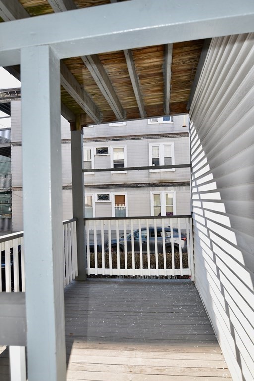 21 Treadway Road, Unit 2 Boston, MA 02125 - Photo 6 of 21 a view of wooden balcony