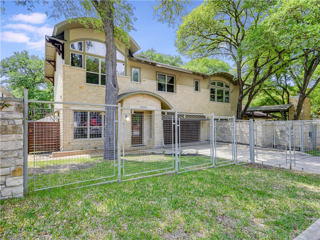 a view of outdoor space yard and front view of a house