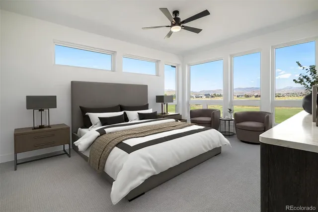 a bedroom with bed and a window