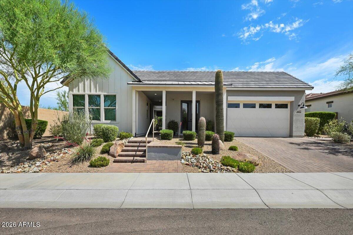 4412 East Roy Rogers Road Cave Creek, AZ 85331 - Photo 2 of 40 front view of a house with potted plants