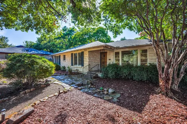 a backyard of a house with green space