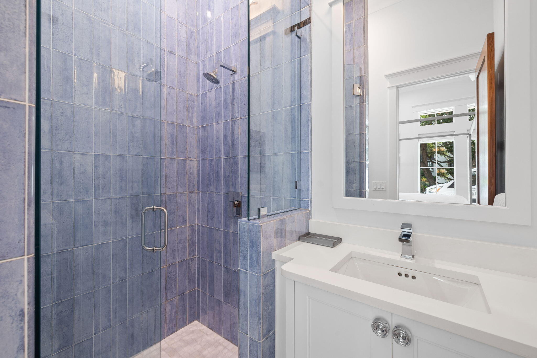 57 Azalea Street Santa Rosa Beach, FL 32459 - Photo 17 of 66 a bathroom with a sink a mirror and a shower