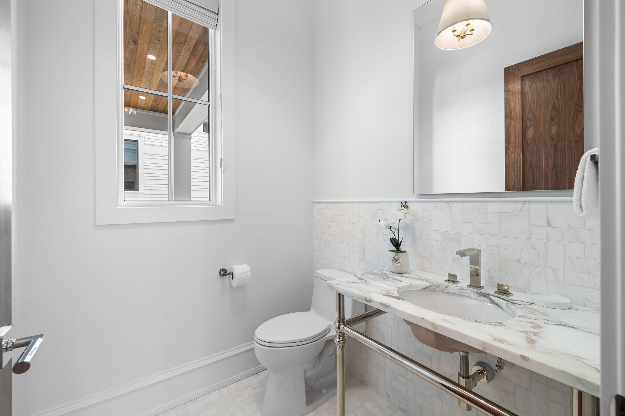 57 Azalea Street Santa Rosa Beach, FL 32459 - Photo 19 of 66 a bathroom with a granite countertop sink toilet and mirror
