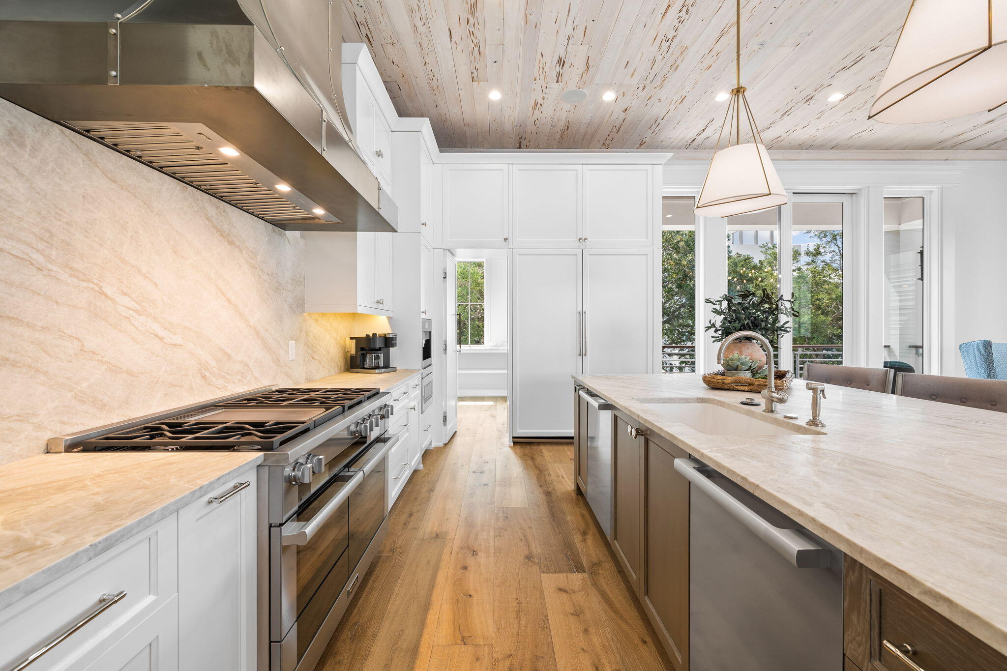57 Azalea Street Santa Rosa Beach, FL 32459 - Photo 26 of 66 a kitchen with stainless steel appliances granite countertop a sink stove and refrigerator