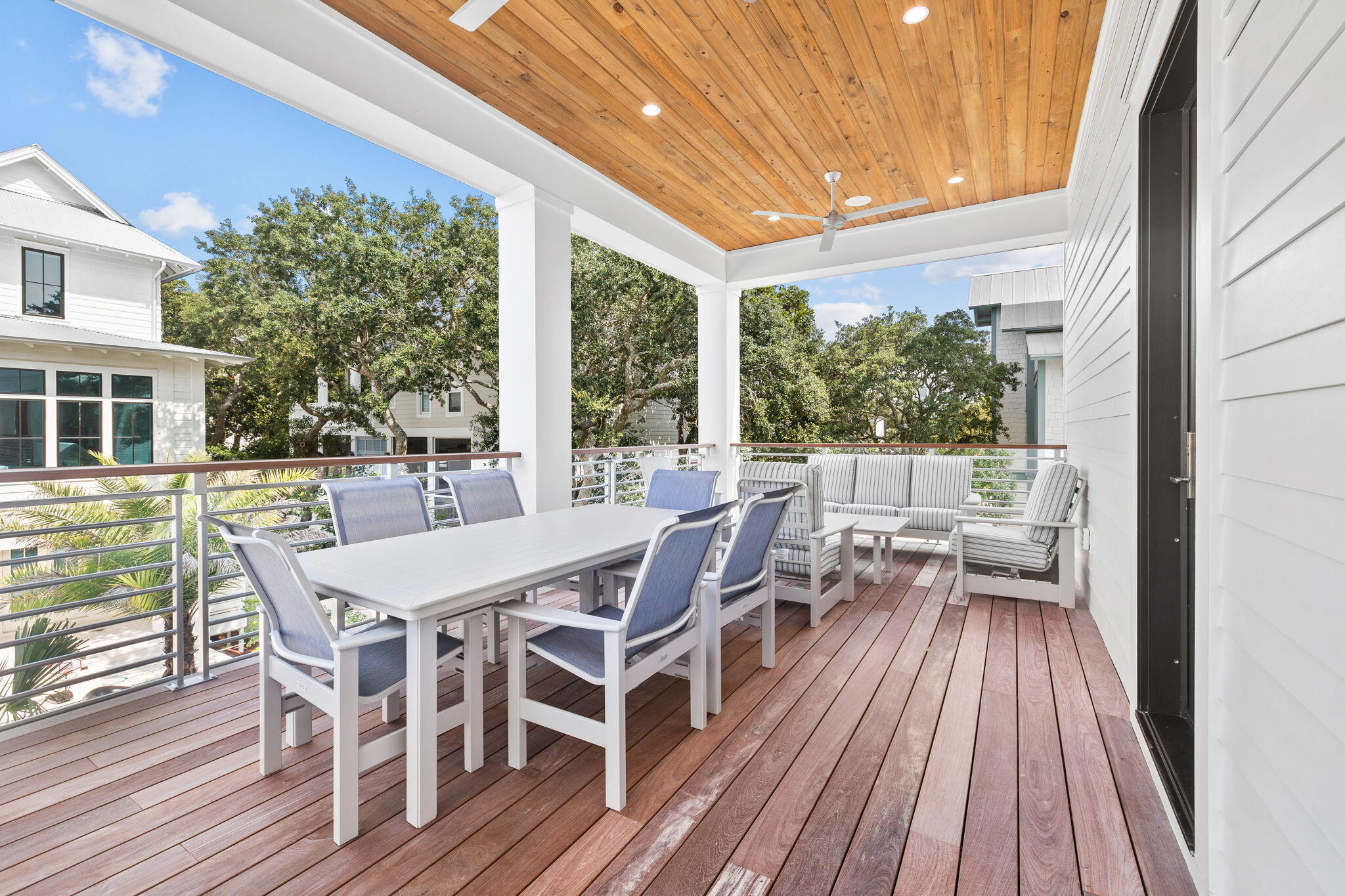 57 Azalea Street Santa Rosa Beach, FL 32459 - Photo 32 of 66 a view of a patio with table and chairs